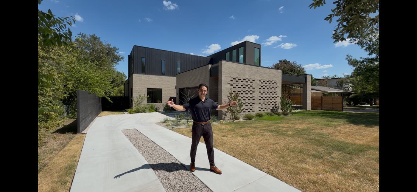 Joe outside a contemporary Austin home